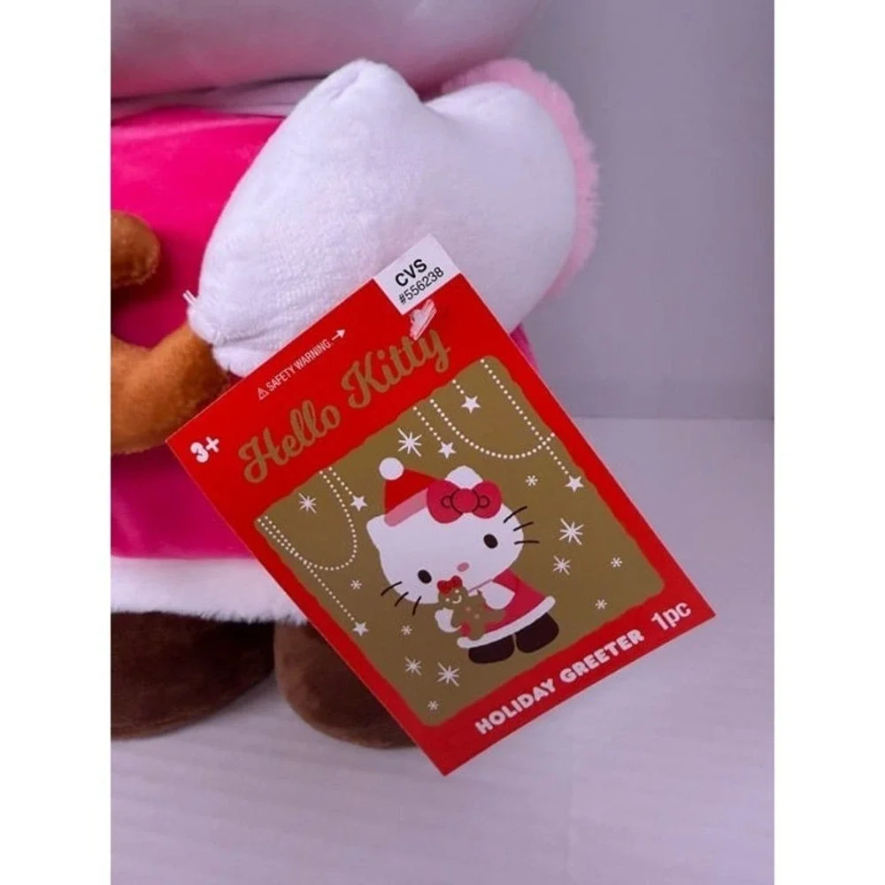 NWT -‎ Hello Kitty holding Gingerbread Cookie Christmas Greeter-CVS 2025